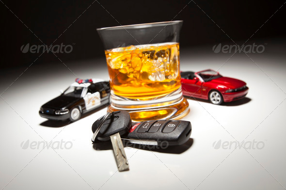 Highway Patrol Police and Sports Car Next to Alcoholic Drink and Keys 