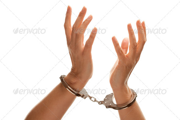 Handcuffed Woman Raising Hands in Air on White PhotoDune Item for Sale
