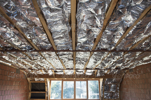 Fibreglass insulation installed in the sloping ceiling of a hous