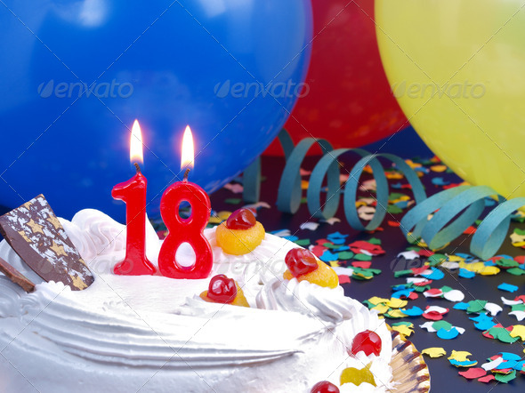 Birthday cake with red candles showing Nr. 18