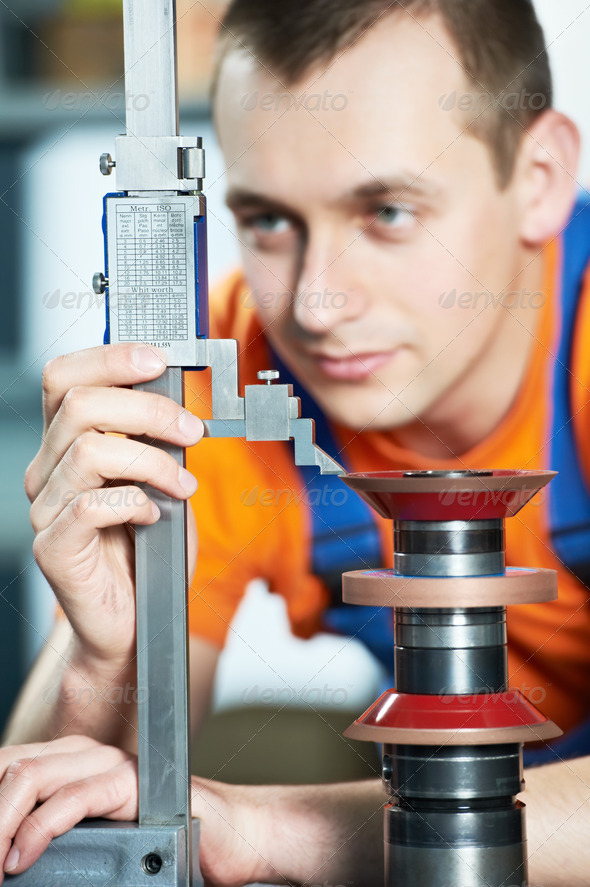 worker measuring cutting tool