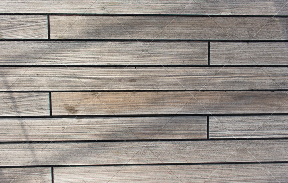 Shadows on wooden ship deck