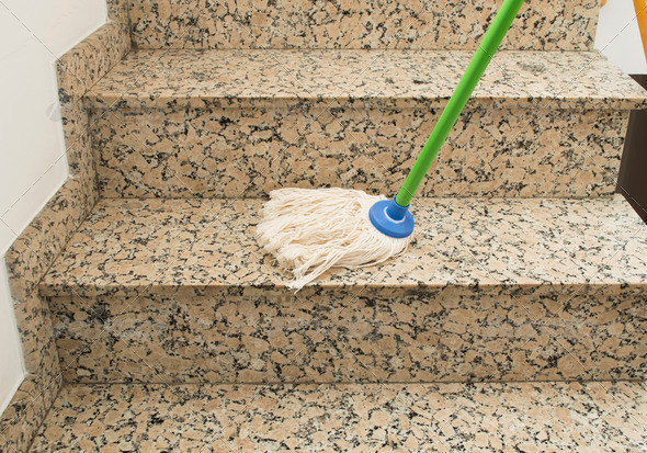 mop cleaning the stairs
