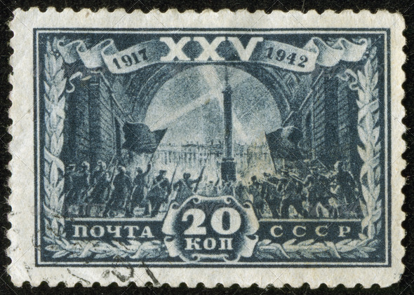 SOVIET UNION – CIRCA 1942: A stamp printed by the SU Post is devoted to the 25th convention of Communist party. It shows the Russian revolution – capture of Winter Palace in St. Petersburg, circa 1942