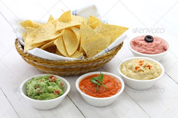 tortilla chips with four dips