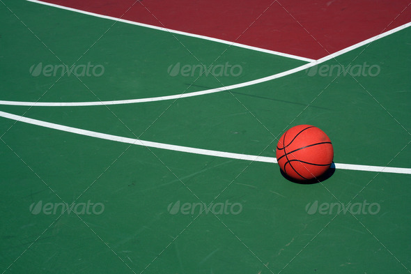 Basketball at three point line