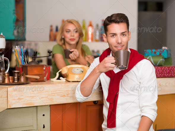 handsome man enjoying a cup of coffee